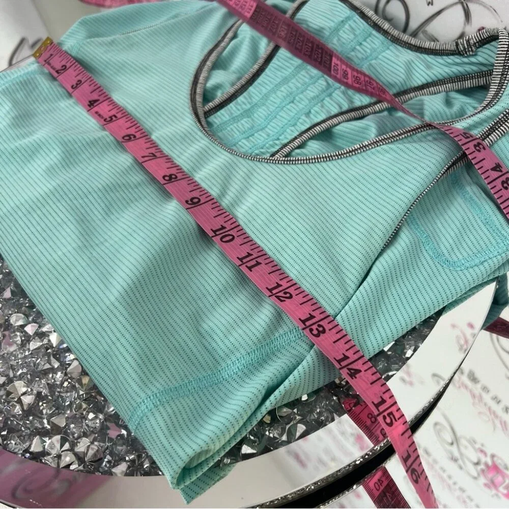 Lululemon tank top stripes racer back Teal Sleeveless Ruffle Hem Top ruffles